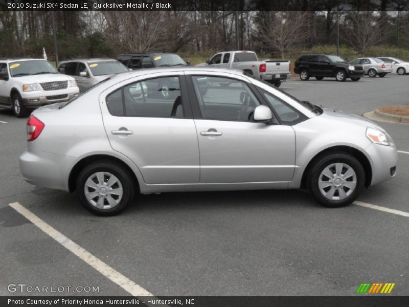 Quicksilver Metallic / Black 2010 Suzuki SX4 Sedan LE