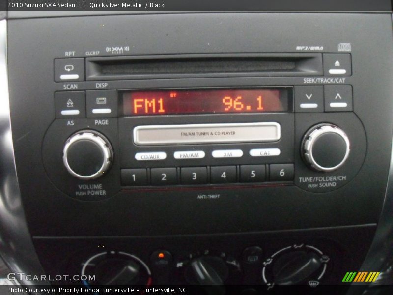 Quicksilver Metallic / Black 2010 Suzuki SX4 Sedan LE