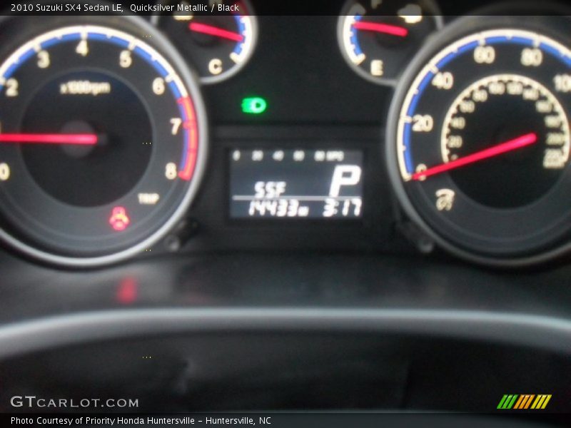 Quicksilver Metallic / Black 2010 Suzuki SX4 Sedan LE