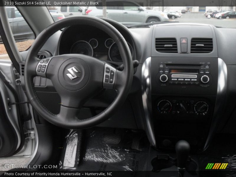 Quicksilver Metallic / Black 2010 Suzuki SX4 Sedan LE