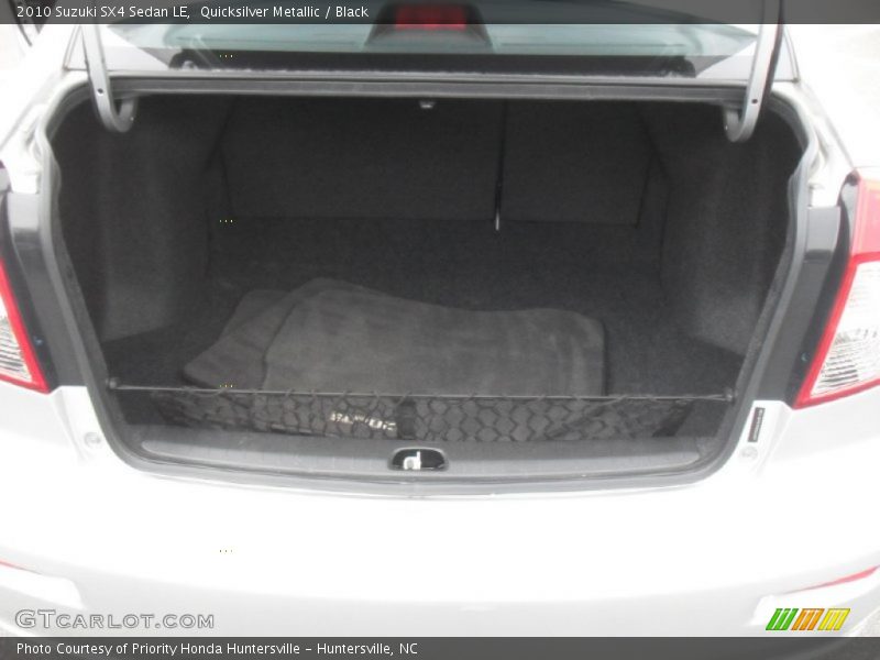 Quicksilver Metallic / Black 2010 Suzuki SX4 Sedan LE