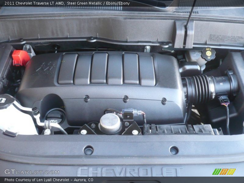 Steel Green Metallic / Ebony/Ebony 2011 Chevrolet Traverse LT AWD