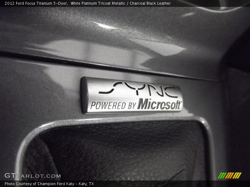 White Platinum Tricoat Metallic / Charcoal Black Leather 2012 Ford Focus Titanium 5-Door