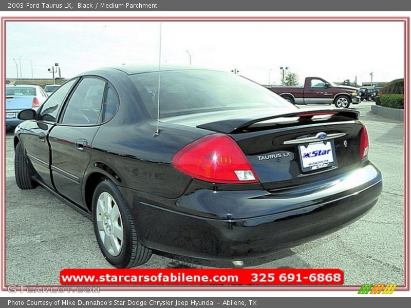 Black / Medium Parchment 2003 Ford Taurus LX