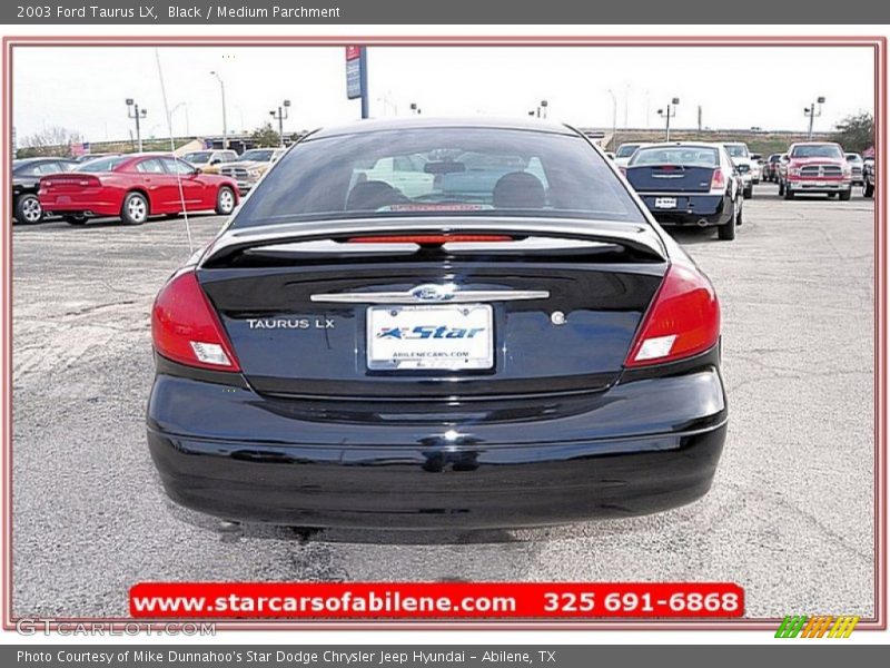 Black / Medium Parchment 2003 Ford Taurus LX