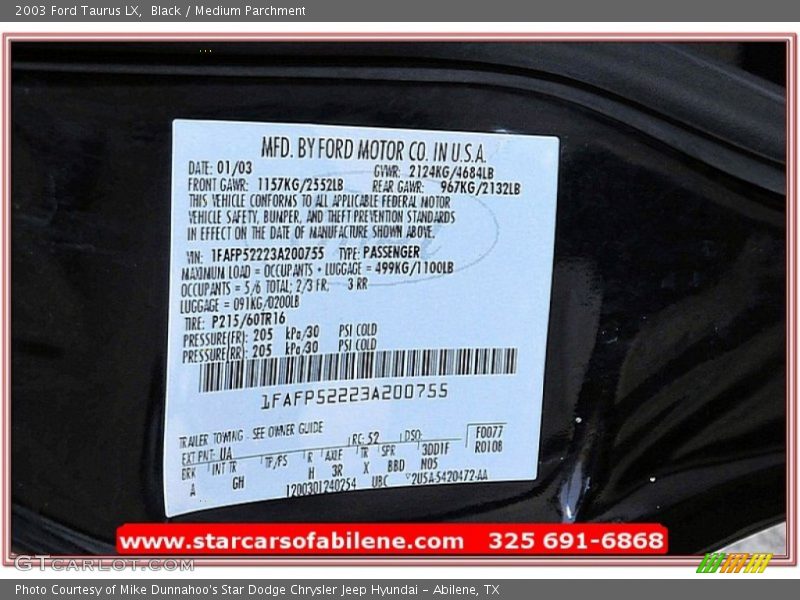 Black / Medium Parchment 2003 Ford Taurus LX