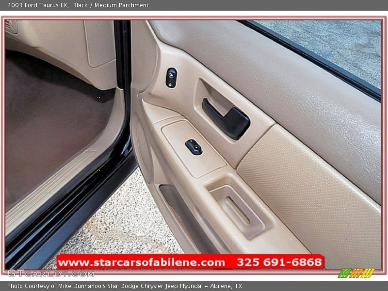 Black / Medium Parchment 2003 Ford Taurus LX