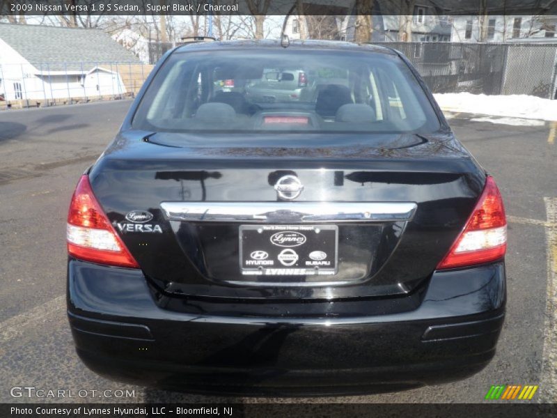 Super Black / Charcoal 2009 Nissan Versa 1.8 S Sedan