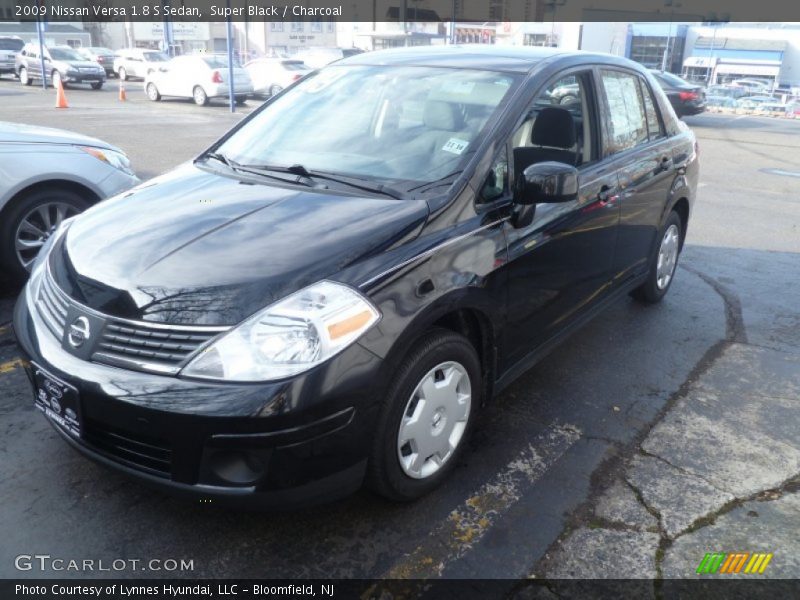 Super Black / Charcoal 2009 Nissan Versa 1.8 S Sedan