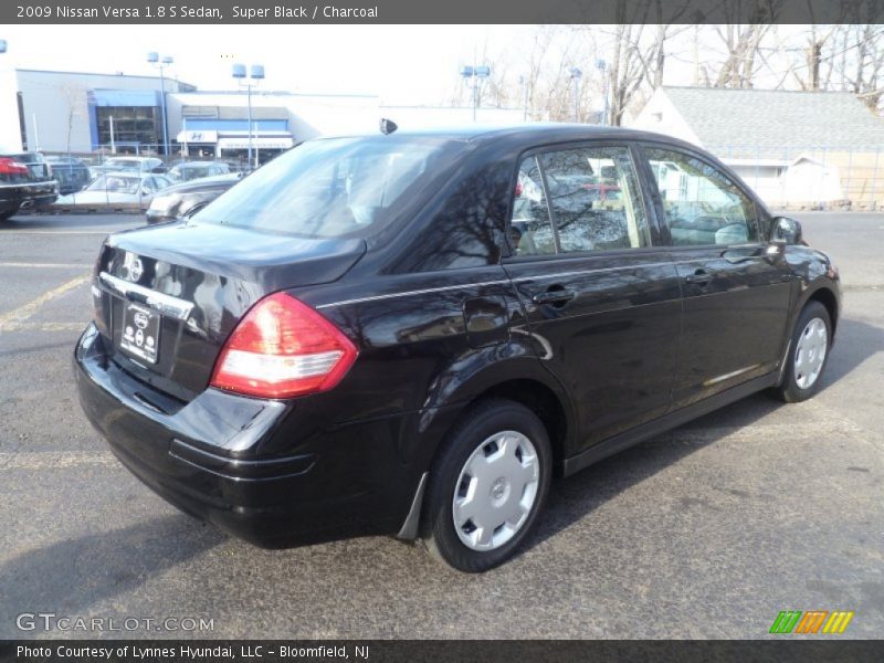 Super Black / Charcoal 2009 Nissan Versa 1.8 S Sedan