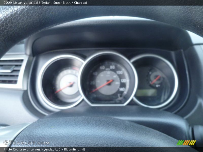 Super Black / Charcoal 2009 Nissan Versa 1.8 S Sedan