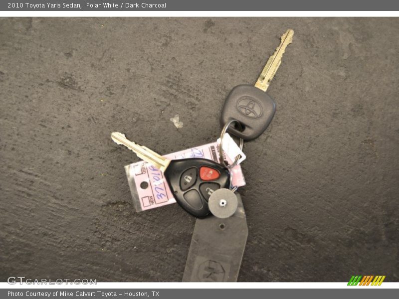 Polar White / Dark Charcoal 2010 Toyota Yaris Sedan