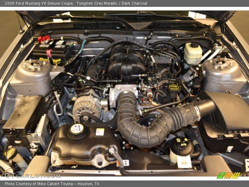 Tungsten Grey Metallic / Dark Charcoal 2006 Ford Mustang V6 Deluxe Coupe