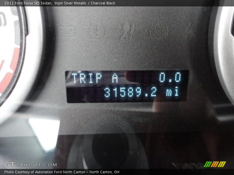 Ingot Silver Metallic / Charcoal Black 2011 Ford Focus SES Sedan