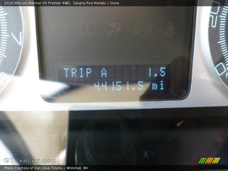 Sangria Red Metallic / Stone 2010 Mercury Mariner V6 Premier 4WD