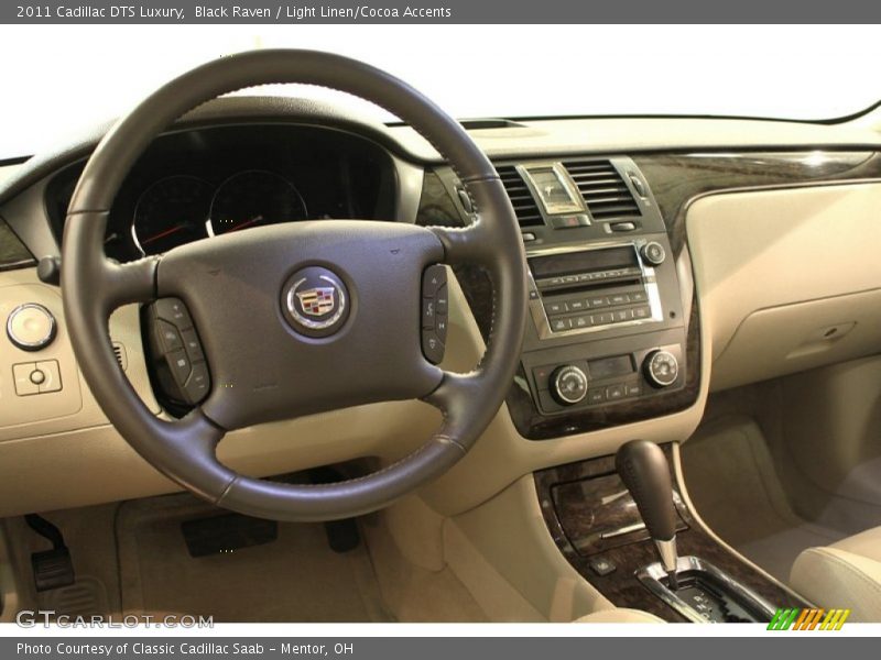 Black Raven / Light Linen/Cocoa Accents 2011 Cadillac DTS Luxury