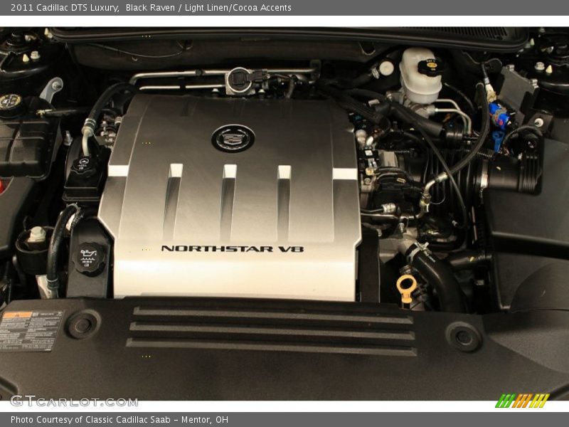 Black Raven / Light Linen/Cocoa Accents 2011 Cadillac DTS Luxury