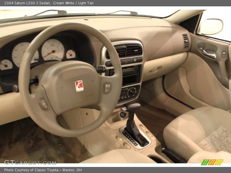 Cream White / Light Tan 2004 Saturn L300 3 Sedan