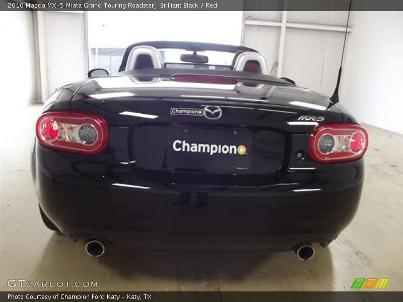 Brilliant Black / Red 2010 Mazda MX-5 Miata Grand Touring Roadster