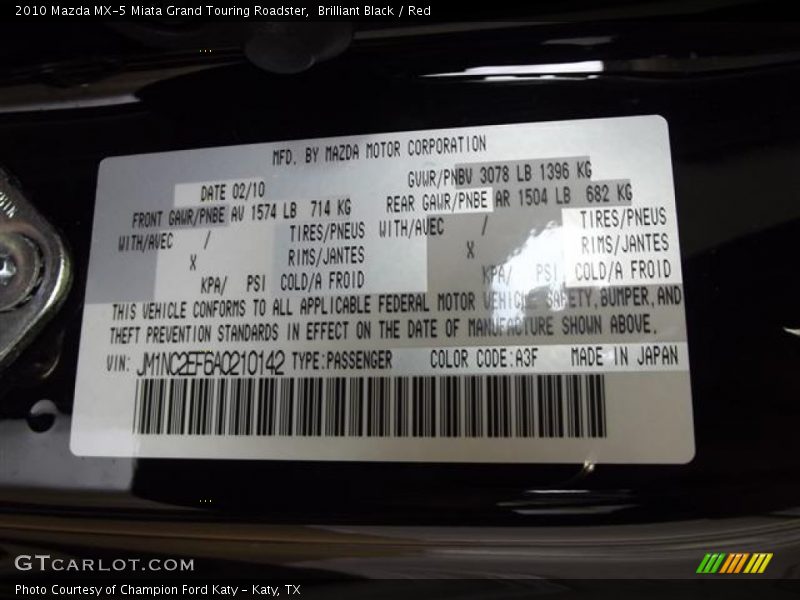 Brilliant Black / Red 2010 Mazda MX-5 Miata Grand Touring Roadster