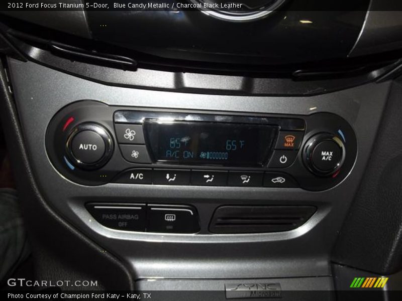 Blue Candy Metallic / Charcoal Black Leather 2012 Ford Focus Titanium 5-Door