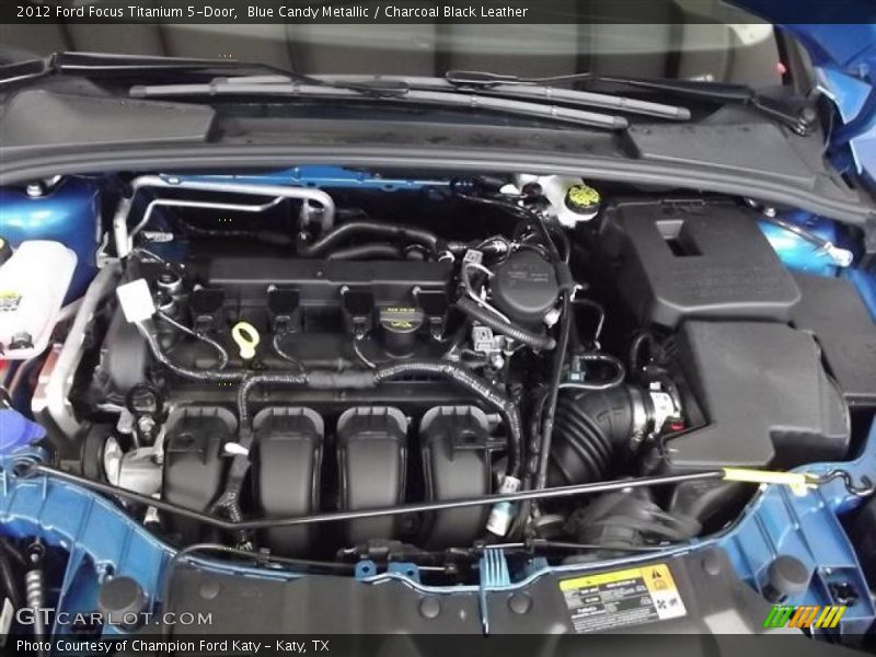 Blue Candy Metallic / Charcoal Black Leather 2012 Ford Focus Titanium 5-Door