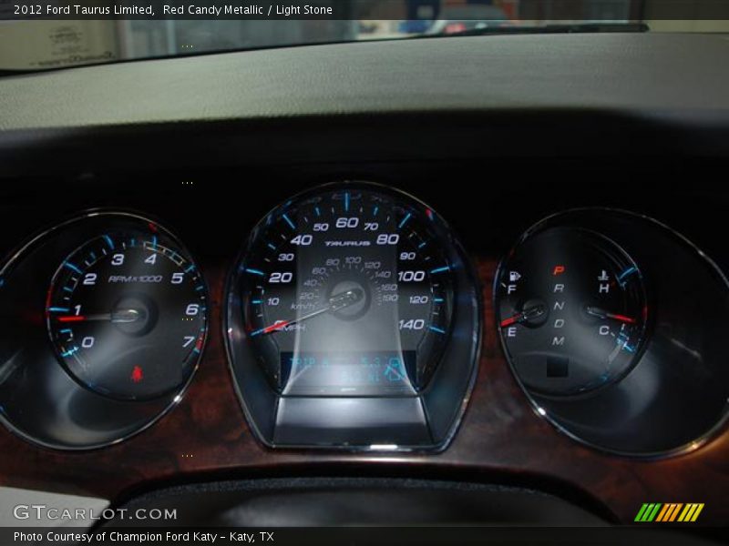 Red Candy Metallic / Light Stone 2012 Ford Taurus Limited