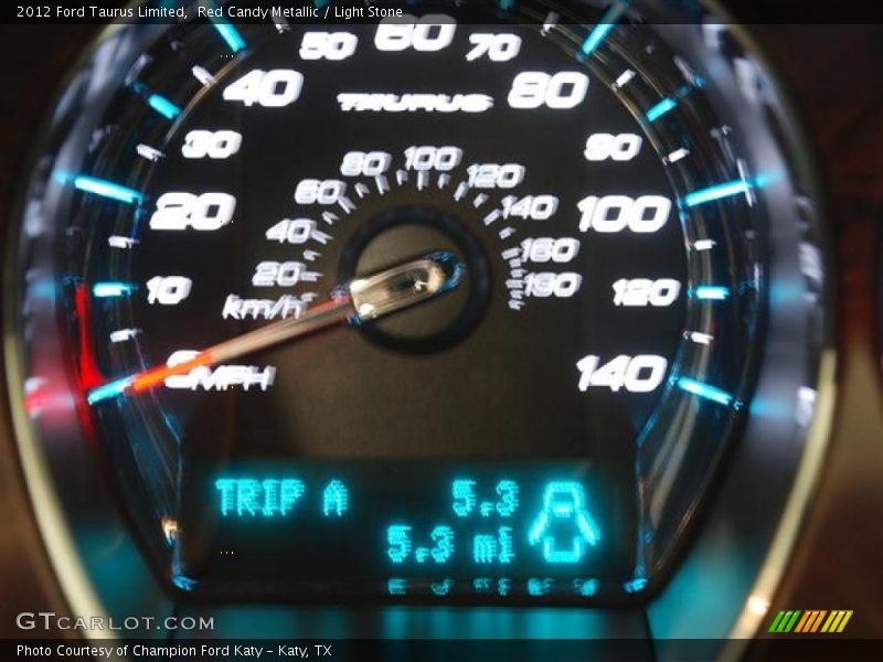 Red Candy Metallic / Light Stone 2012 Ford Taurus Limited