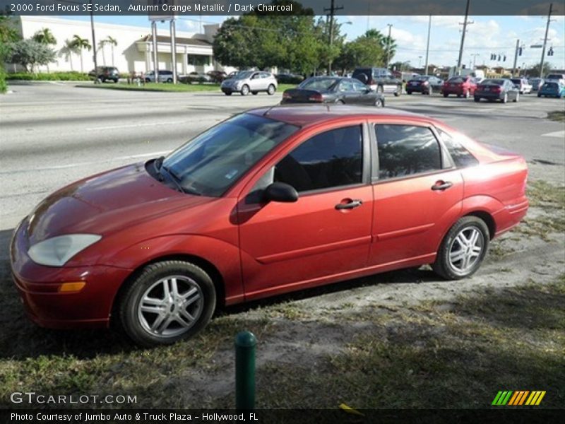 Autumn Orange Metallic / Dark Charcoal 2000 Ford Focus SE Sedan