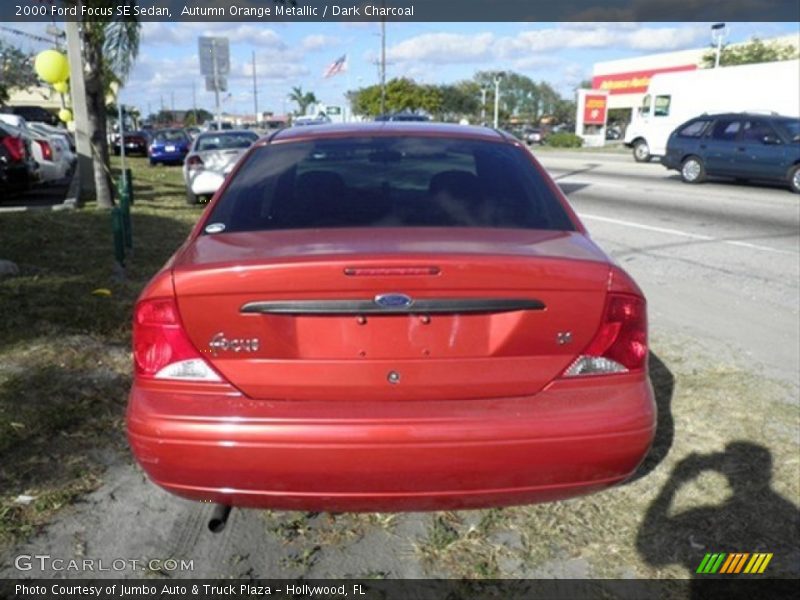 Autumn Orange Metallic / Dark Charcoal 2000 Ford Focus SE Sedan