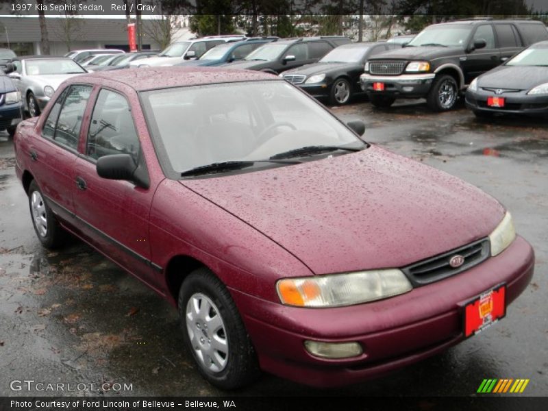Red / Gray 1997 Kia Sephia Sedan
