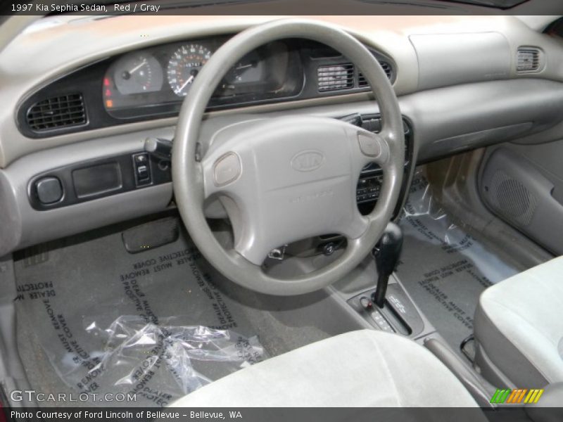 Red / Gray 1997 Kia Sephia Sedan
