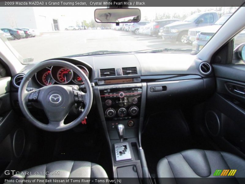 Crystal White Pearl Mica / Black 2009 Mazda MAZDA3 s Grand Touring Sedan