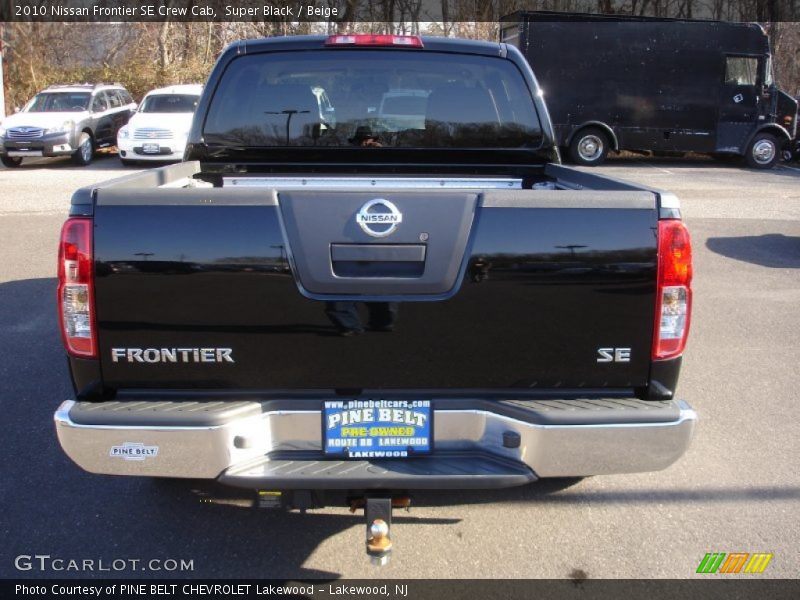 Super Black / Beige 2010 Nissan Frontier SE Crew Cab