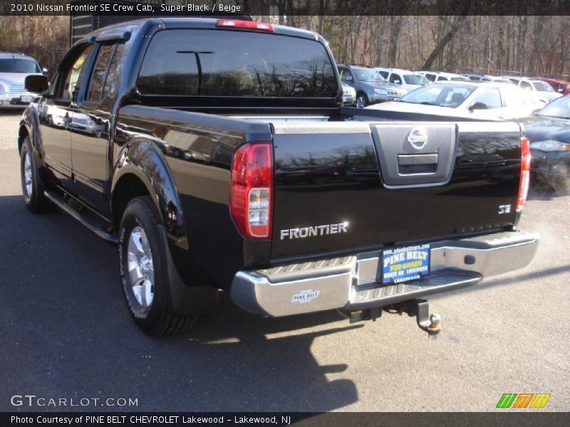 Super Black / Beige 2010 Nissan Frontier SE Crew Cab