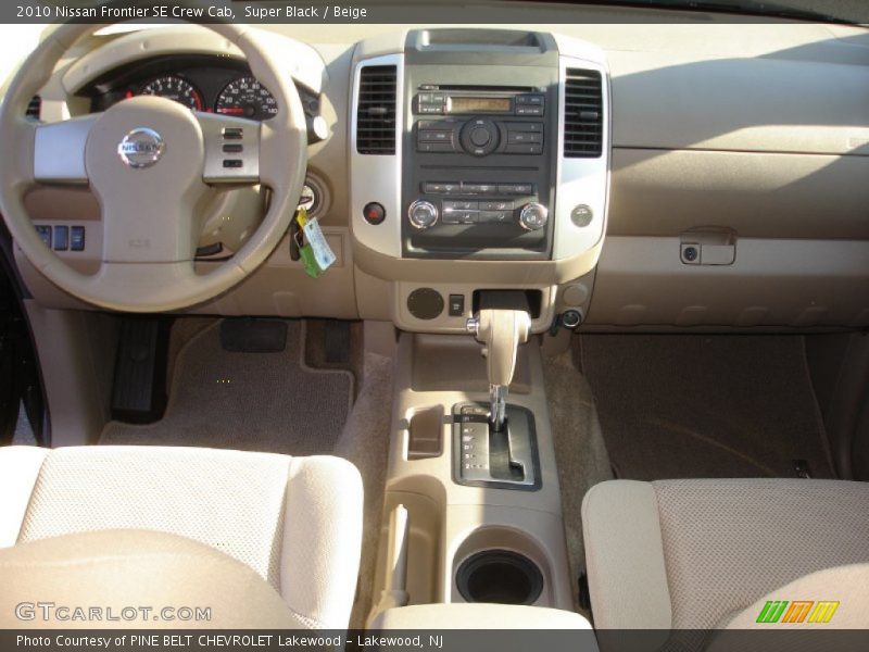 Super Black / Beige 2010 Nissan Frontier SE Crew Cab