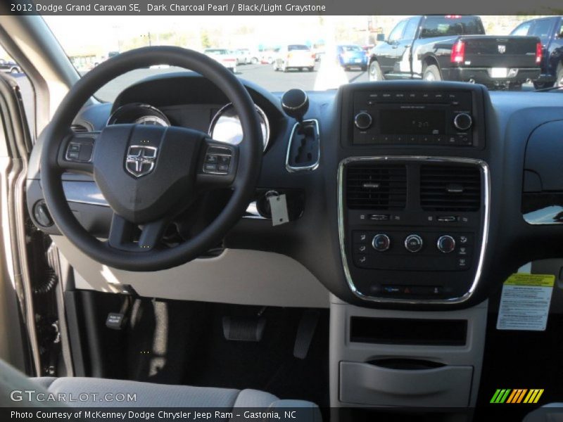 Dark Charcoal Pearl / Black/Light Graystone 2012 Dodge Grand Caravan SE
