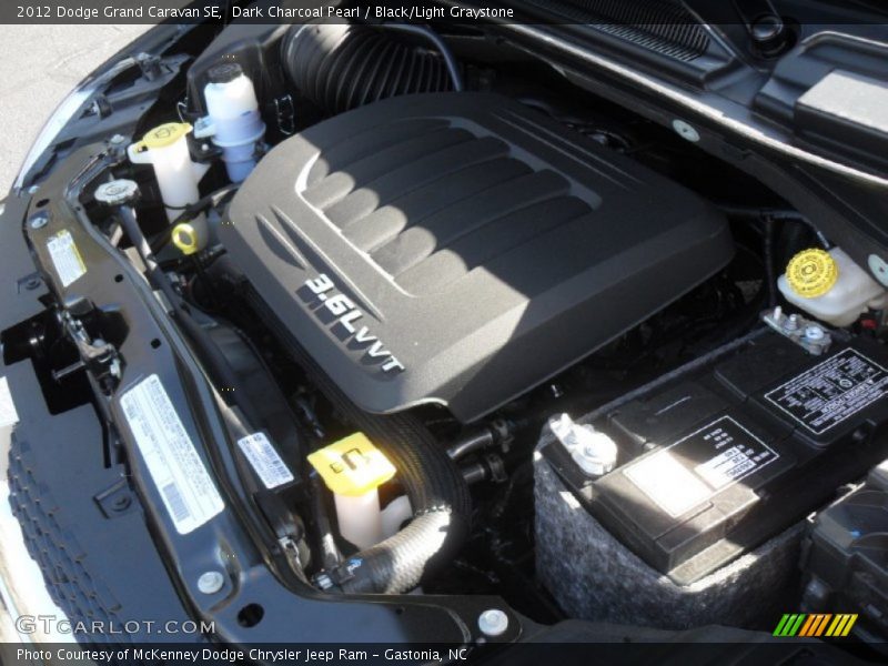 Dark Charcoal Pearl / Black/Light Graystone 2012 Dodge Grand Caravan SE