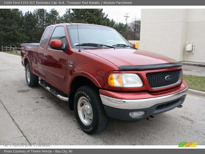 Toreador Red Metallic / Medium Parchment 2000 Ford F150 XLT Extended Cab 4x4
