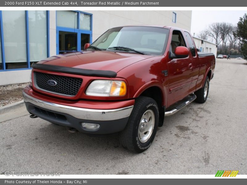 Toreador Red Metallic / Medium Parchment 2000 Ford F150 XLT Extended Cab 4x4