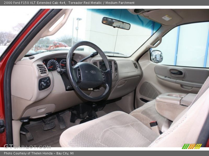 Toreador Red Metallic / Medium Parchment 2000 Ford F150 XLT Extended Cab 4x4
