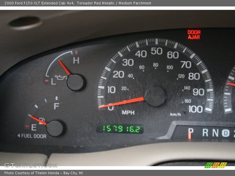 Toreador Red Metallic / Medium Parchment 2000 Ford F150 XLT Extended Cab 4x4