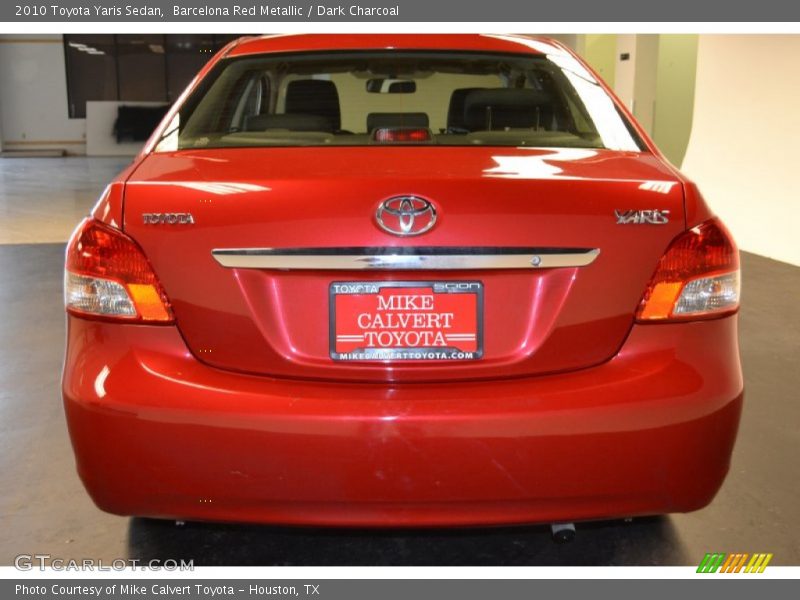 Barcelona Red Metallic / Dark Charcoal 2010 Toyota Yaris Sedan