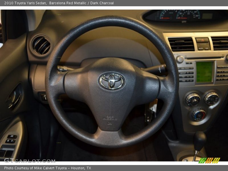 Barcelona Red Metallic / Dark Charcoal 2010 Toyota Yaris Sedan