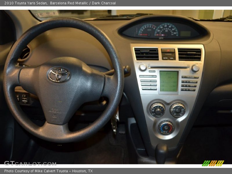 Barcelona Red Metallic / Dark Charcoal 2010 Toyota Yaris Sedan