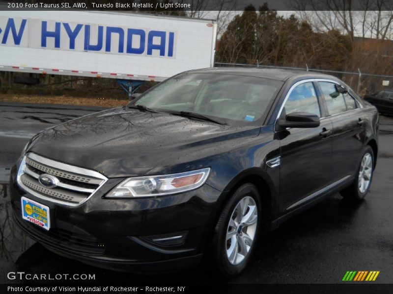 Tuxedo Black Metallic / Light Stone 2010 Ford Taurus SEL AWD