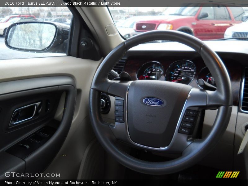 Tuxedo Black Metallic / Light Stone 2010 Ford Taurus SEL AWD