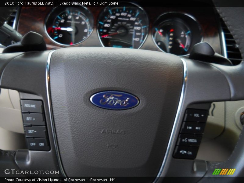 Tuxedo Black Metallic / Light Stone 2010 Ford Taurus SEL AWD