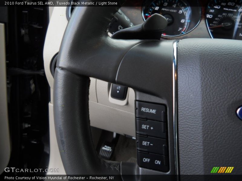 Tuxedo Black Metallic / Light Stone 2010 Ford Taurus SEL AWD