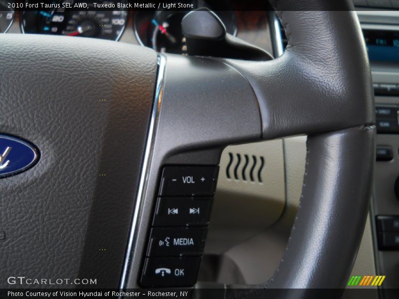 Tuxedo Black Metallic / Light Stone 2010 Ford Taurus SEL AWD